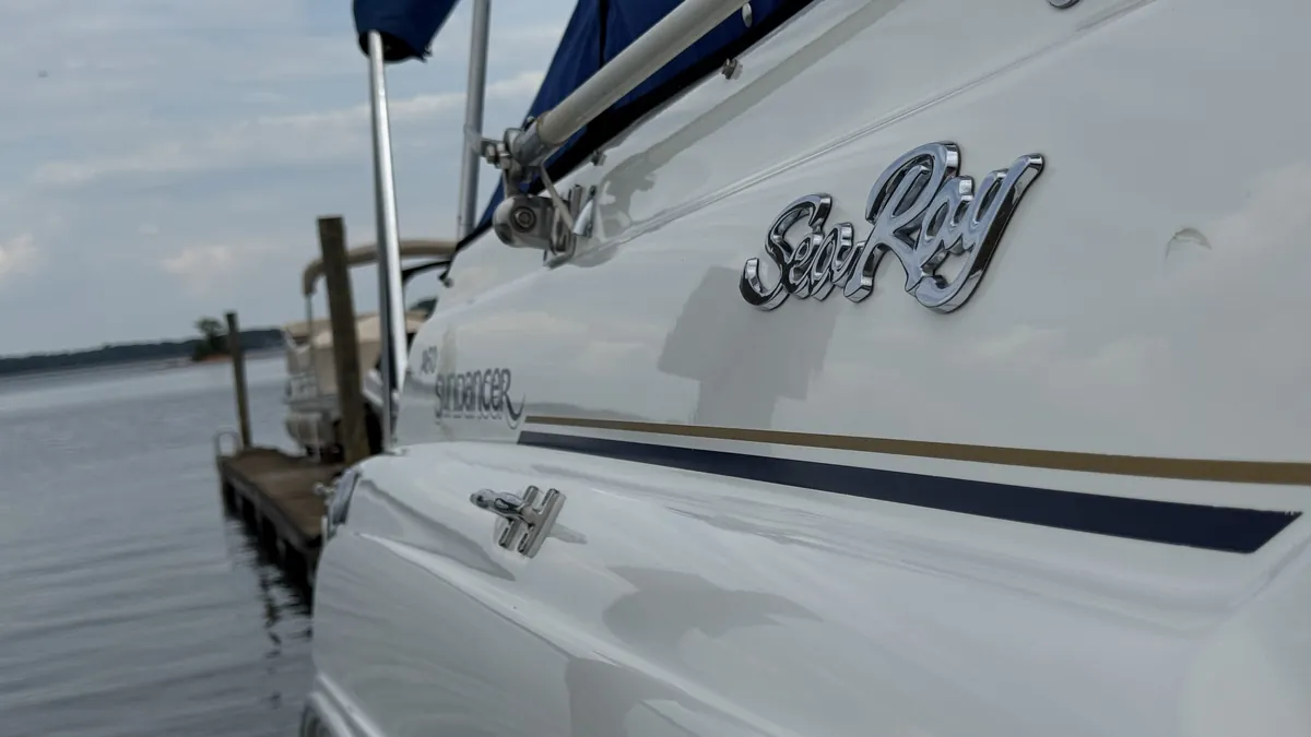 Clean, glossy Sea Ray Sundancer gelcoat at a Lake Norman dock